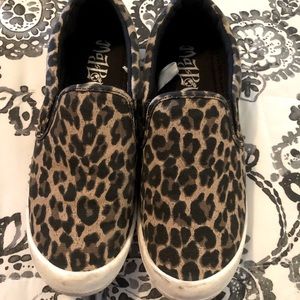 Comfortable slip on canvas shoes. Lightly worn.